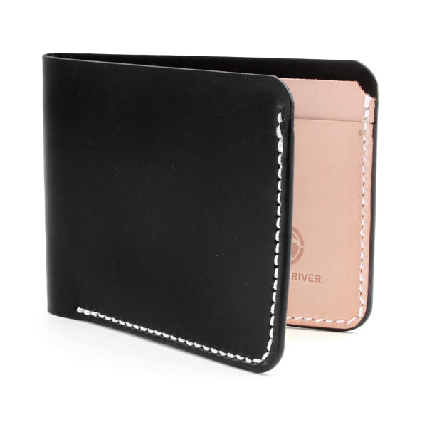 black wallet with natural veg tan interior