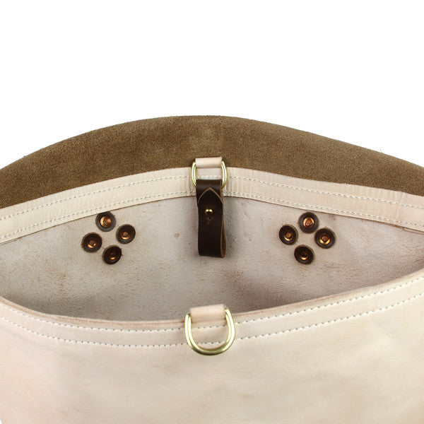 leather messenger bag interior rivet detail
