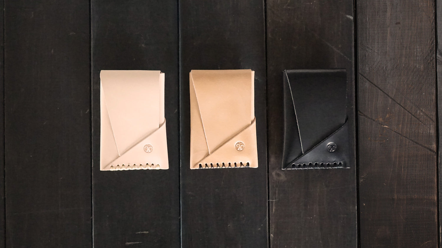 Minimal leather card wallet card holder with a flap in three colors - natural vegetable tanned, whiskey color and black leather