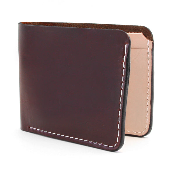 brown wallet with natural veg tan interior