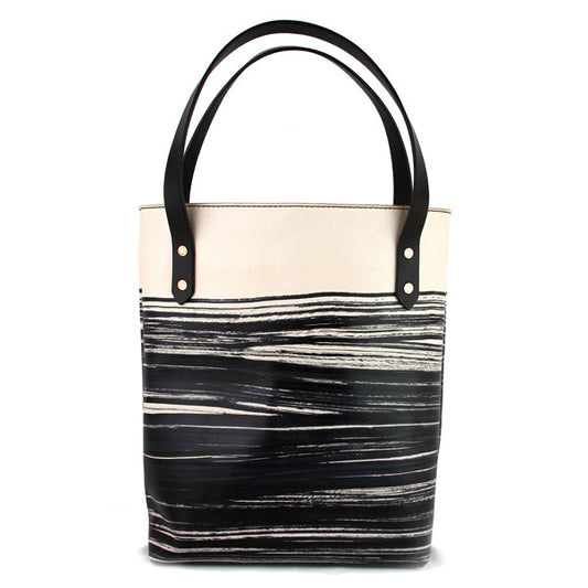 black veg tan leather tote bag